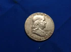 1962 Franklin Half Dollar (orange/yellow)