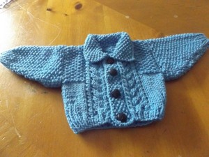hand knitted baby aran cardigans