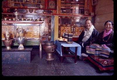 Couple sitting at home drinking millet beer,North Sikkim,India,Lost Kingdom