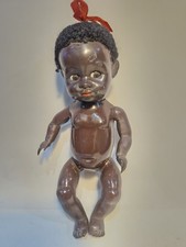 Vintage black doll made in England Hard plastic