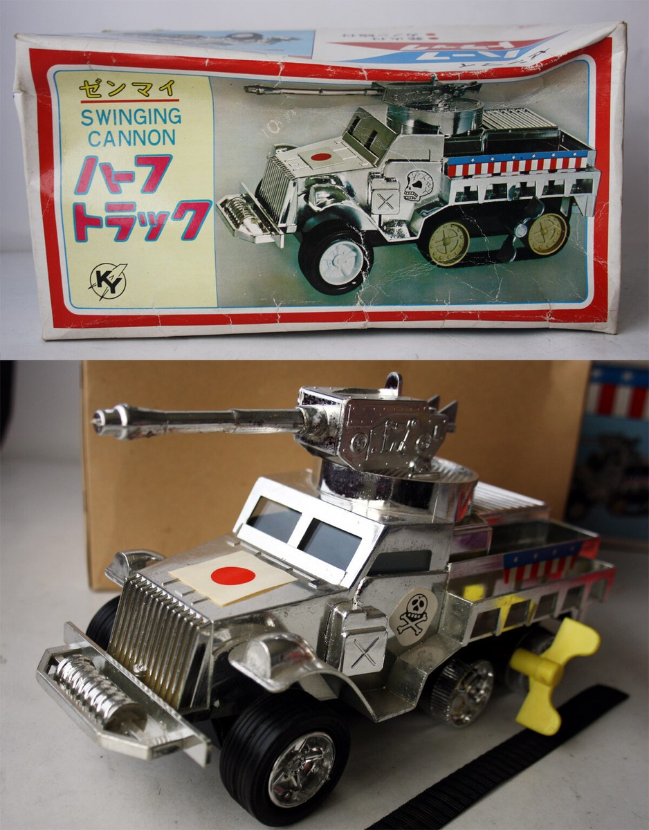 RARE VINTAGE 60'S WIND UP SWINGING CANNON HALF TRACK TIN TOY