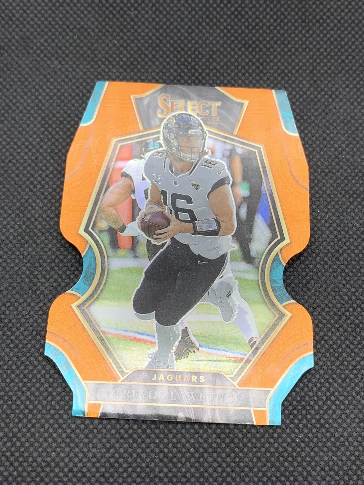 2022 Select NFL Trevor Lawrence #145 Premier Level Orange Die Cut /199 Jaguars