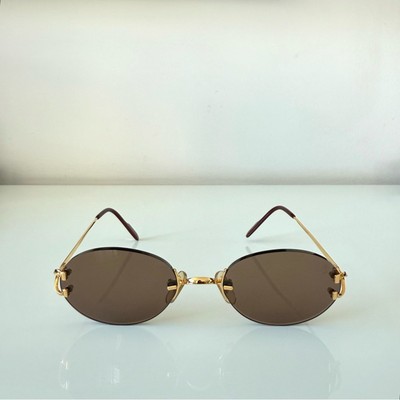Cartier Women\'s Rimless Sunglasses - Brown Lenses with Gold Frame Cartier Panthère Rimless Sunglasses Brown x Gold Women Front  main image 2
