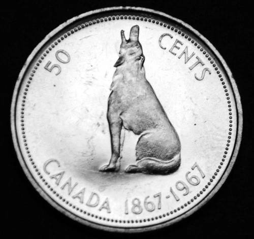 1967 50¢ silver in a paper flip UNC and looks great