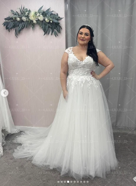 Vestidos de novia talla grande manga gorra línea A cuello en V apliques de encaje vestidos de novia Foto 2 de 4