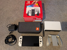 Nintendo Switch OLED Handheld Console 64GB White. Including 64GB SD, Carry Case