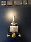 Three position toggle switch. on/off/on