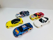 TYCO   5   NOS bodies  KELLOGGS, VALVOLINE, HOT WHEELS, VETTE, STEALTH 