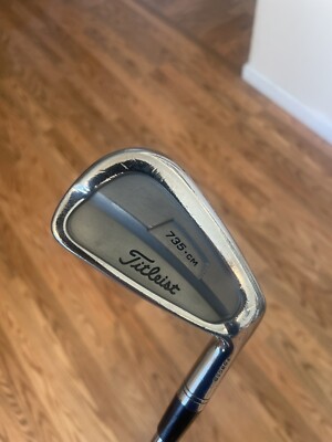 titleist 735-cm, 6 iron. (don t know the flex).