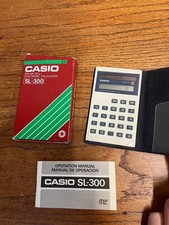Casio SL-300 Solar Cell/ Electronic Calculator with Box  Manual