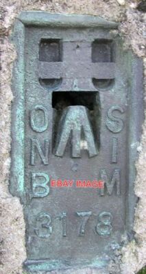 PHOTO  OS NI BENCHMARK FLUSH BRACKET BENCH MARK SET INTO THE SIDE OF THE MULLAGH