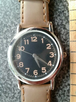 WRIST WATCH CAMEL IN COLOR NEW BATTERY