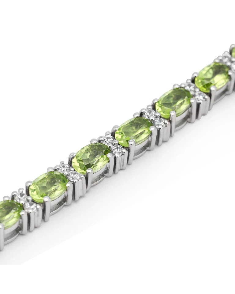 Brazalete de compromiso de tenis de diamantes de peridoto natural de corte ovalado de oro de 14k Foto 3 de 4