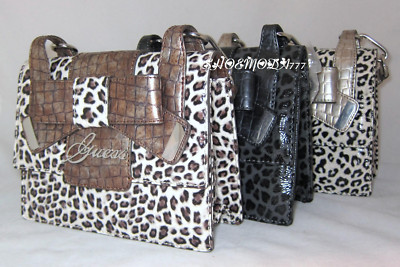 guess purses leopard print inside