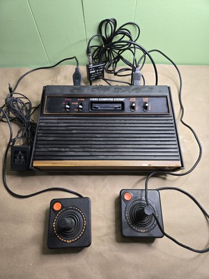 Atari 2600 Console With 2 Controllers And Sega Branded RF Adapter Untested