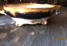 PARTIE DE LEGUMIER EN PORCELAINE DE VENISE PAULY BLEU ET OR MONOGRAMME