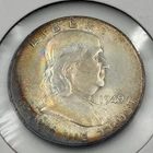 1949 D Franklin Half Dollar with peripheral toning and light rainbow qualities
