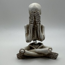 Skeleton Skull Figurine Cross-Legged with Spring Mechanism Covering Face