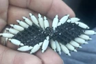 Vintage Hattie Carnegie Milk Glass & Jet Glass Pin  Unique Twisted Shape 3 1/2”