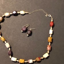Multi colored stone and gold colored bead necklace and pierced earring set