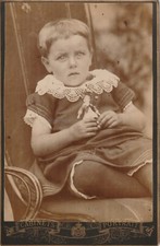 ANTIQUE CABINET CARD: ADORABLE YOUNG GIRL WITH LITTLE DOLL, VERY SHORT HAIR