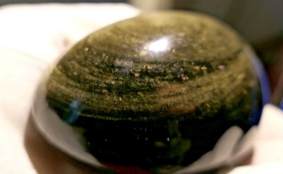 Gros oeuf en pierre polie obsidienne argentée dorée 8 cm - Photo 3/4