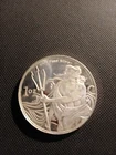 1 Troy Ounce .999 Fine Silver Trident Bullion Round. lot#4