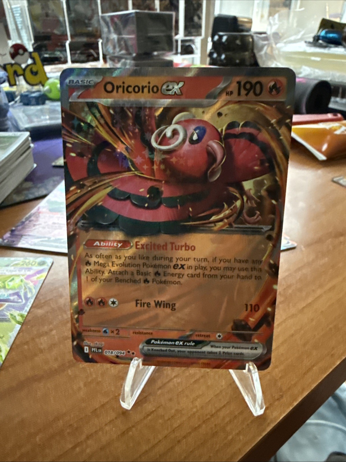 Oricorio ex 018/094 Me02: Phantasmal Flames Holo