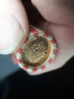 WHEAT PENNY ROLL WITH A UNKNOWN BU WHEAT PENNY SHOWING
