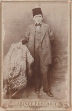 OTTOMAN PERIOD VINTAGE CABIN PHOTOGRAPH - ONE ARM BOY WITH A FEZ