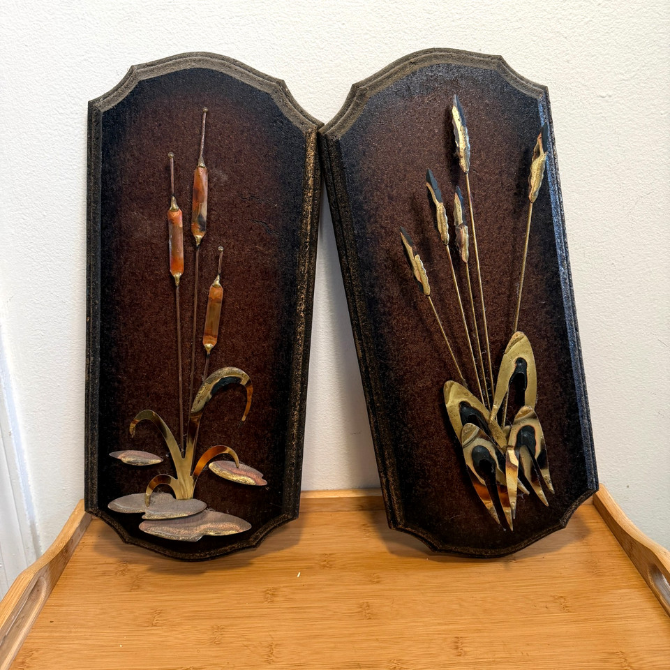 Brutalist metal wall art panels with cattail and lily pad motifs — raw, textural, and undeniably cool in a way modern reproductions can never replicate.