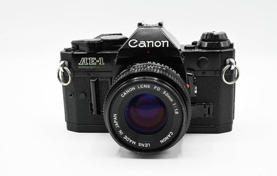 Canon AE-1 Program Black 35mm SLR Film Camera w/ 50mm f/1.8 FD Lens - WORKING !