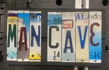 MAN CAVE handcrafted sign from license plates.