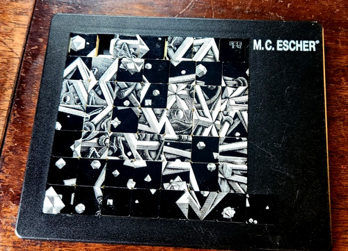 M.C. Escher - Sliding Tile Jigsaw Puzzle “Stars" 1948 Made by Pussycat - Germany