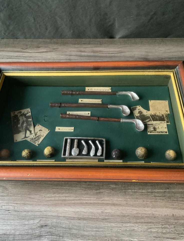 Expositor de caja de sombra de hierros y pelotas de golf historia vintage de la evolución del golf Foto 3 de 4
