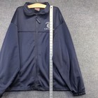 Blue men's full zip jacket with embroidered "Made in USA" text, 2XL size, shown beside a tape measure on white surface.