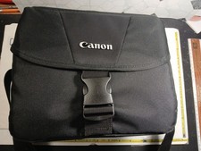 Canon EOS Rebel T7 DSLR Camera with 18-50mm ES-62 Lens Case Bundle