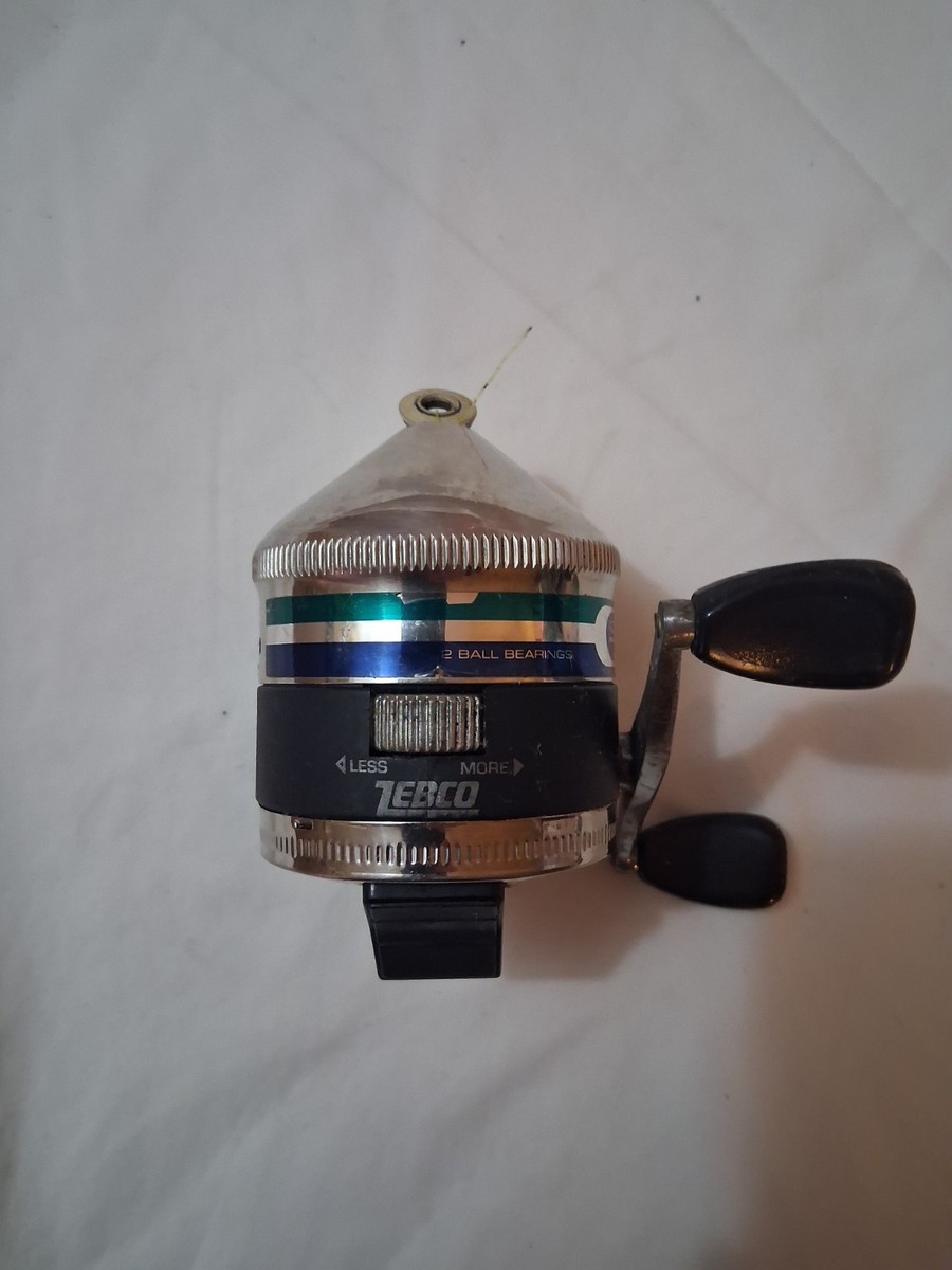 Moulinet de pêche vintage Zebco modèle 33 2 rivets, pied en