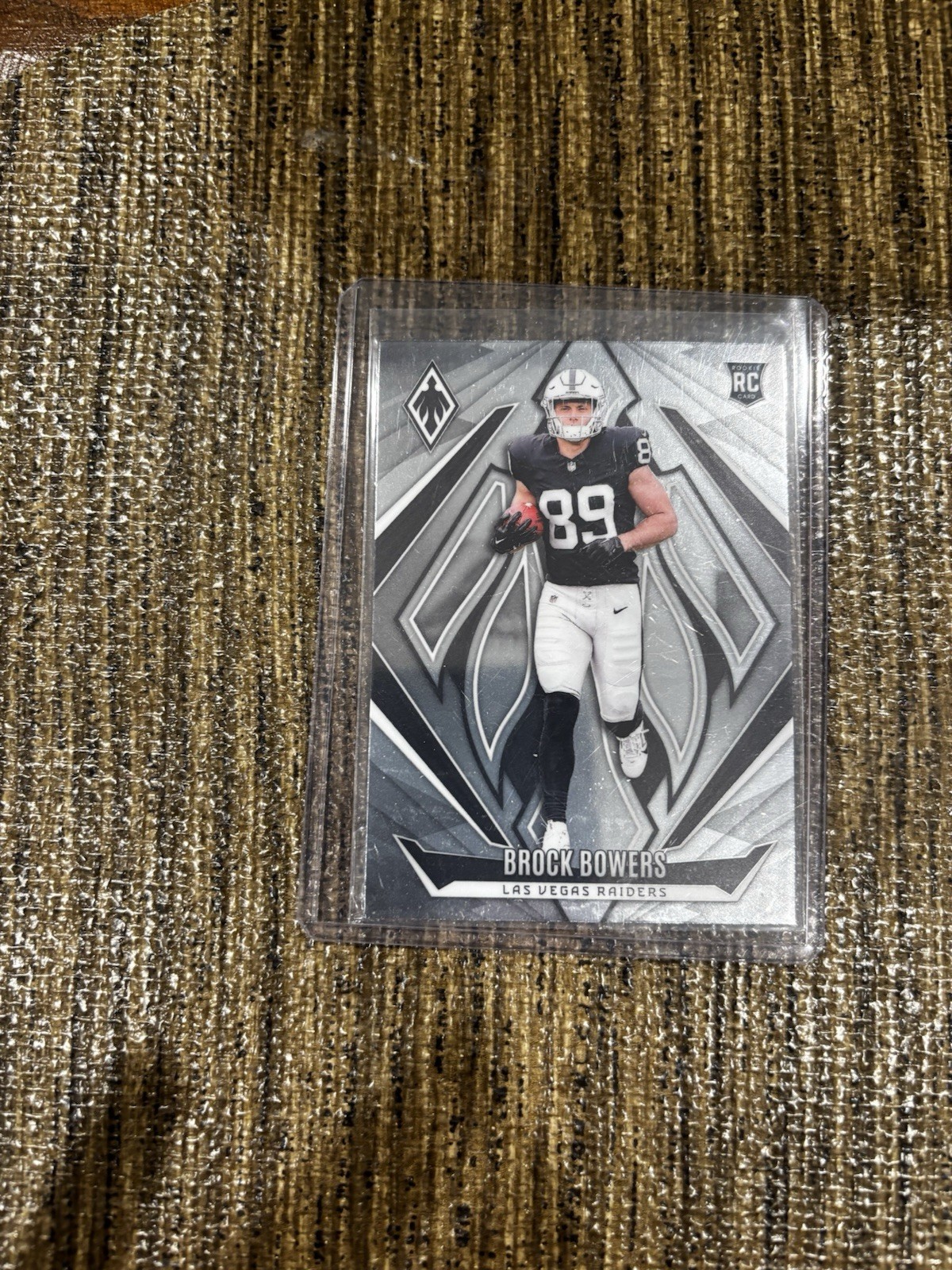 2024 Panini Phoenix - Rookies Brock Bowers #165 Silver (RC)