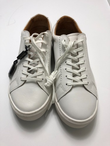 white plimsolls leather