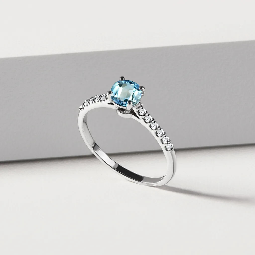Platinum 950 engagement ring with 1.14CT blue topaz and moissanite accents-image