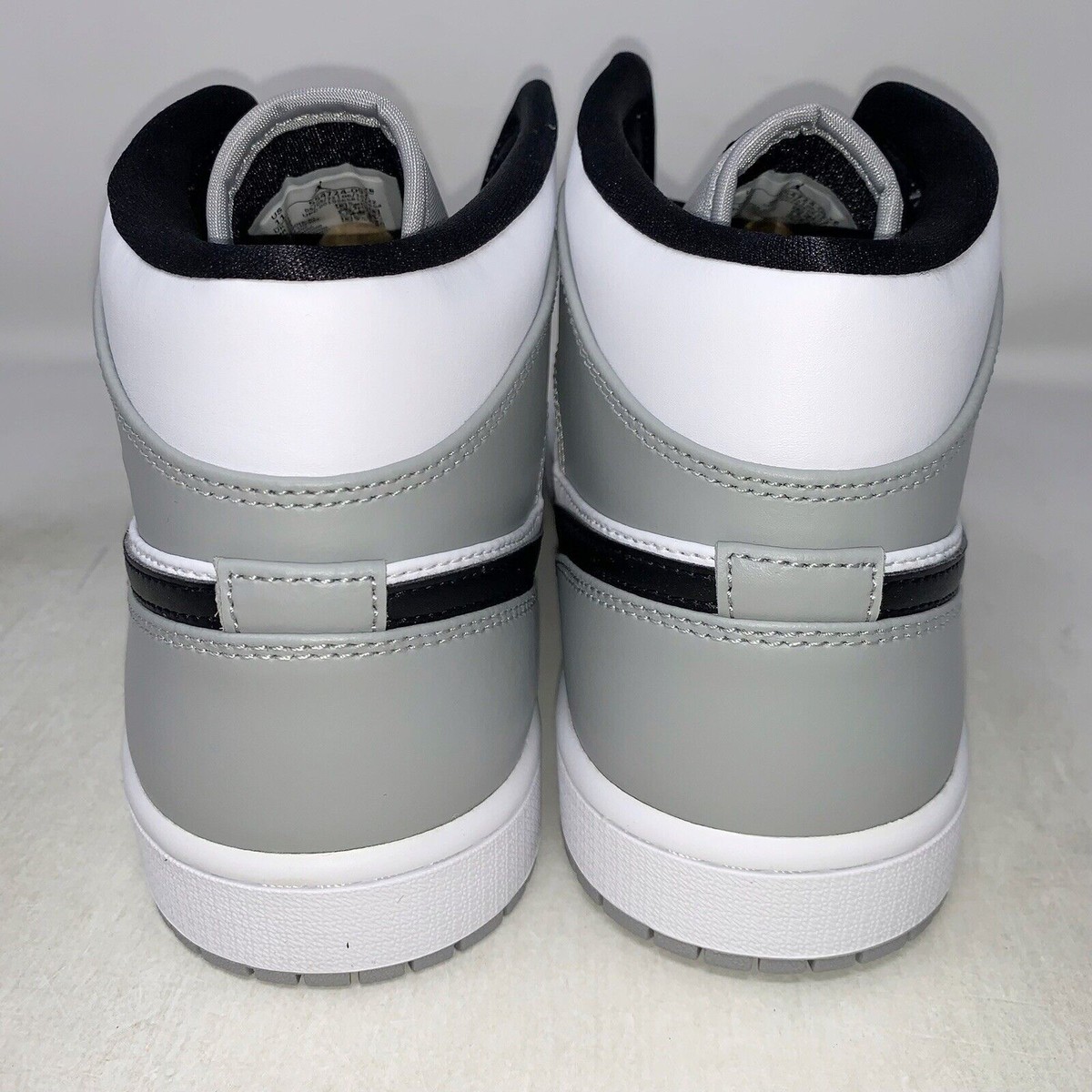 Nike Air Jordan 1 Retro Mid Light Smoke Grey 4-14 Black Nike Air Jordan 1 Retro Mid Light Smoke Grey 4-14 Black