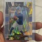 2025 Panini Select - Premier Level Jaxson Dart Black And Gold Shock Prizm (RC)