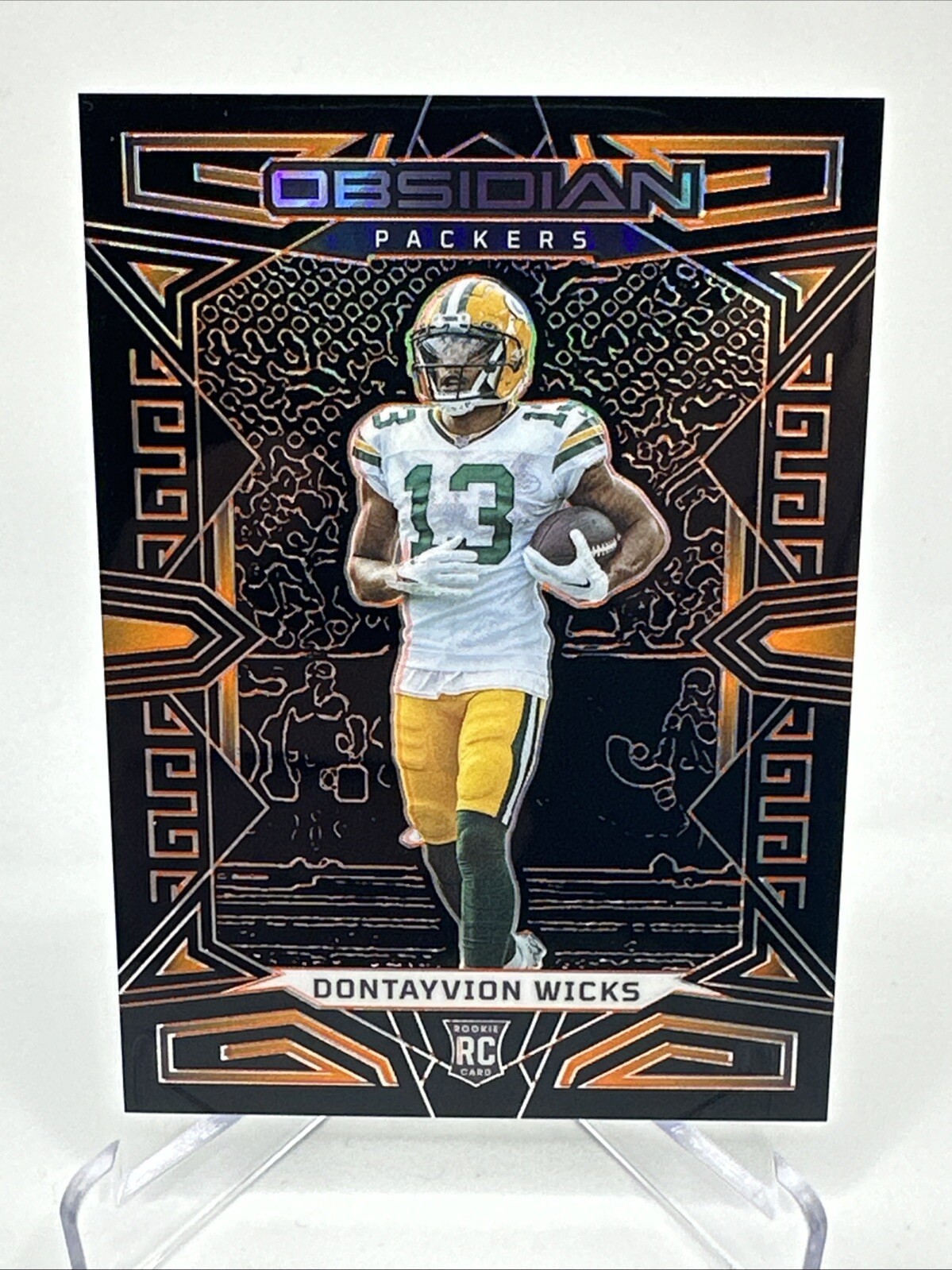 2023 Panini Obsidian #138 DONTAYVION WICKS Orange Rookie /49 Packers RC SP