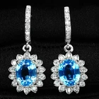 Entrancing Swiss Blue Topaz Oval 5.15Ct 925 Sterling Silver White Gold Earrings