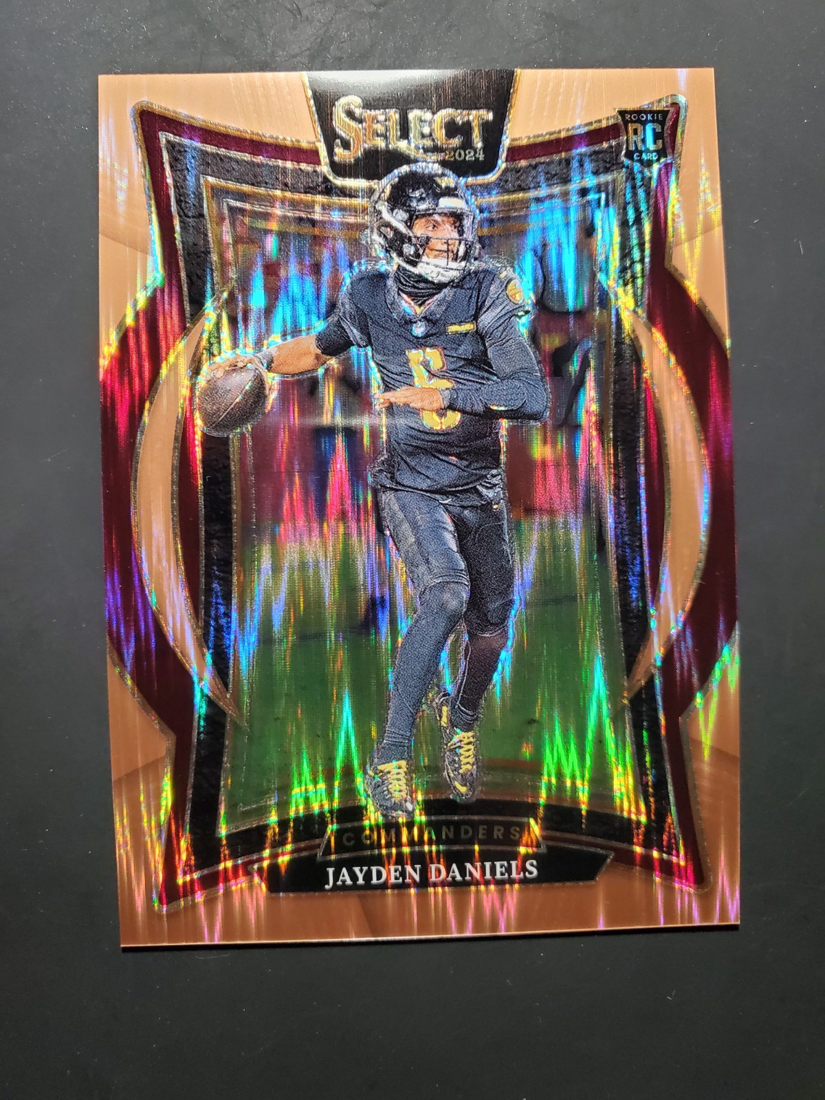 2024 Panini Select Concourse Jayden Daniels #26 Copper Shock Prizm /299 (RC)