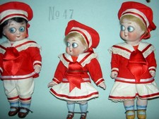 THREE ANTIQUE all bisque, German KESTNER GOOGLY dolls factory stock mint-on-card