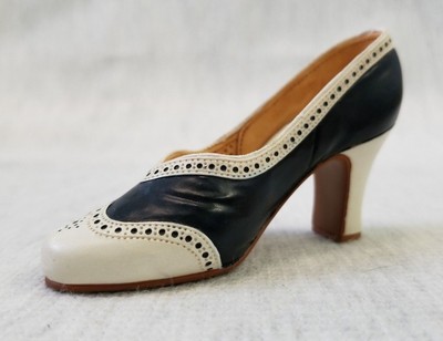 navy and white spectator pumps
