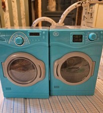 TOY WASHER AND DRYER ACTUALLY LOOKS AND SOUNDS LIKE REAL. GOOD CONDITION