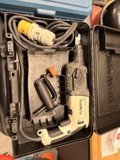 Makita HR2470WX 240V SDS Plus Rotary Hammer Drill with Chisel Bits